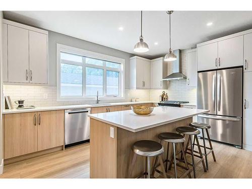 339 Hendon Drive Nw, Calgary, AB - Indoor Photo Showing Kitchen With Upgraded Kitchen