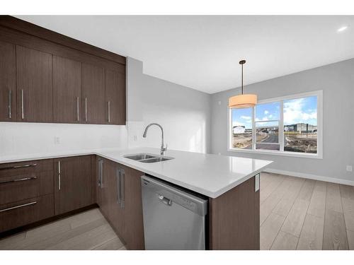 273 Rangeview Way Se, Calgary, AB - Indoor Photo Showing Kitchen With Double Sink