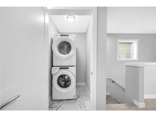 273 Rangeview Way Se, Calgary, AB - Indoor Photo Showing Laundry Room