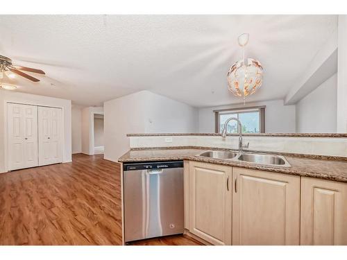 2321-8 Bridlecrest Drive Sw, Calgary, AB - Indoor Photo Showing Kitchen With Double Sink
