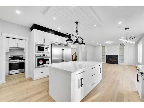 208 Waterford Heath, Chestermere, AB - Indoor Photo Showing Kitchen With Stainless Steel Kitchen With Upgraded Kitchen