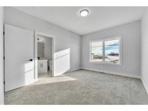 208 Waterford Heath, Chestermere, AB - Indoor Photo Showing Other Room