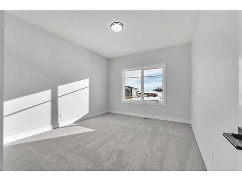 208 Waterford Heath, Chestermere, AB - Indoor Photo Showing Other Room