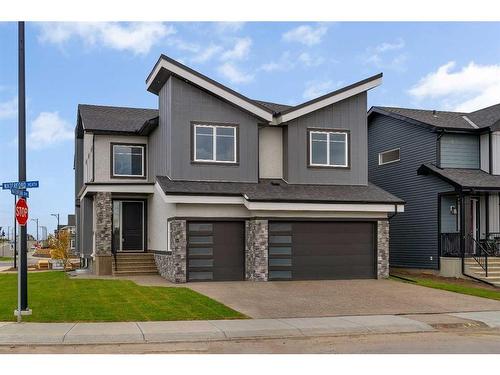 208 Waterford Heath, Chestermere, AB - Outdoor With Facade