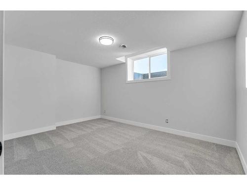 208 Waterford Heath, Chestermere, AB - Indoor Photo Showing Other Room