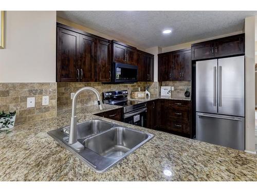 82 Skyview Springs Rise Ne, Calgary, AB - Indoor Photo Showing Kitchen With Double Sink