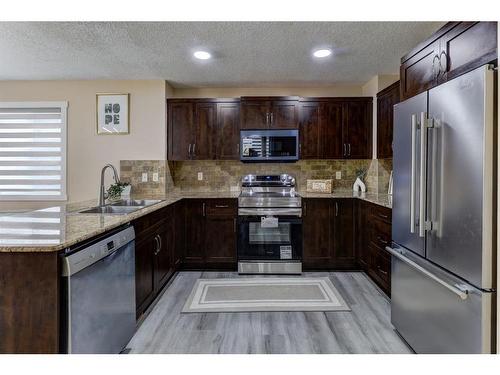 82 Skyview Springs Rise Ne, Calgary, AB - Indoor Photo Showing Kitchen With Double Sink With Upgraded Kitchen