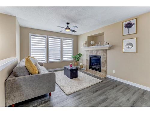 82 Skyview Springs Rise Ne, Calgary, AB - Indoor Photo Showing Living Room With Fireplace