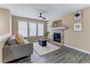 82 Skyview Springs Rise Ne, Calgary, AB  - Indoor Photo Showing Living Room With Fireplace 