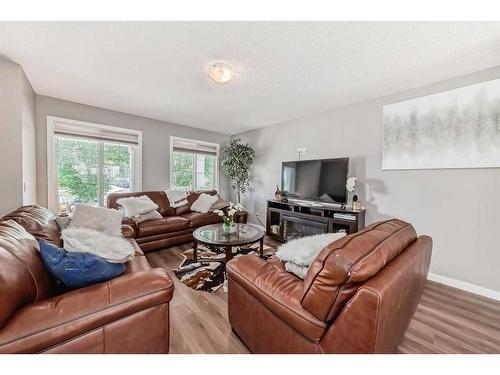 148 Copperstone Drive Se, Calgary, AB - Indoor Photo Showing Living Room