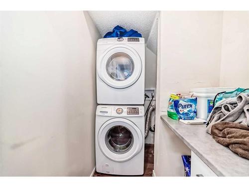 148 Copperstone Drive Se, Calgary, AB - Indoor Photo Showing Laundry Room