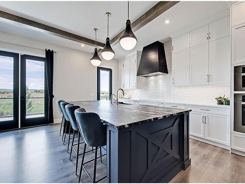 11 Chokecherry Ridge, Rural Rocky View County, AB - Indoor Photo Showing Kitchen With Upgraded Kitchen