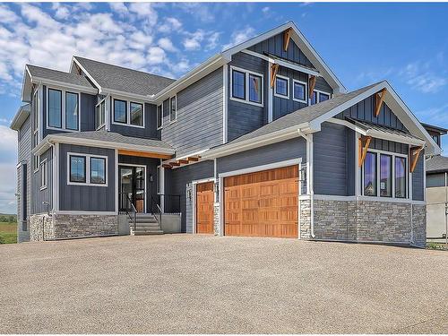 11 Chokecherry Ridge, Rural Rocky View County, AB - Outdoor With Facade