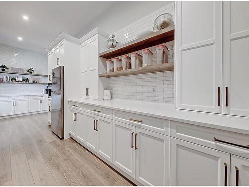 11 Chokecherry Ridge, Rural Rocky View County, AB - Indoor Photo Showing Kitchen