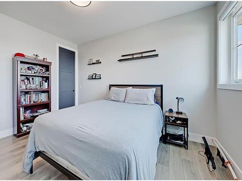 11 Chokecherry Ridge, Rural Rocky View County, AB - Indoor Photo Showing Bedroom