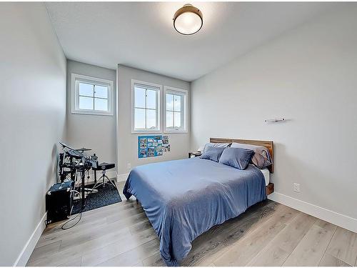 11 Chokecherry Ridge, Rural Rocky View County, AB - Indoor Photo Showing Bedroom