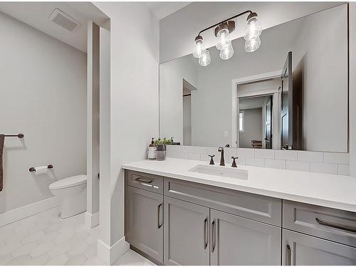 11 Chokecherry Ridge, Rural Rocky View County, AB - Indoor Photo Showing Bathroom