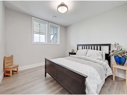 11 Chokecherry Ridge, Rural Rocky View County, AB - Indoor Photo Showing Bedroom