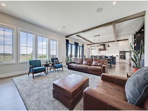 11 Chokecherry Ridge, Rural Rocky View County, AB - Indoor Photo Showing Living Room