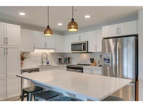 1309-450 Kincora Glen Road Nw, Calgary, AB - Indoor Photo Showing Kitchen With Stainless Steel Kitchen With Upgraded Kitchen