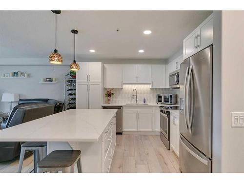 1309-450 Kincora Glen Road Nw, Calgary, AB - Indoor Photo Showing Kitchen With Stainless Steel Kitchen With Upgraded Kitchen