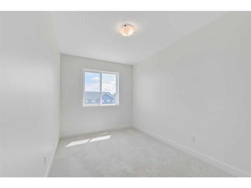 135 Amblefield Avenue Nw, Calgary, AB - Indoor Photo Showing Other Room