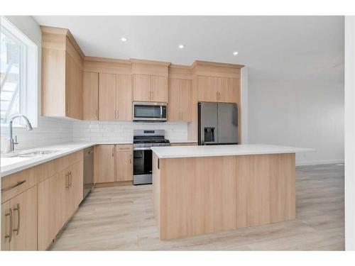 135 Amblefield Avenue Nw, Calgary, AB - Indoor Photo Showing Kitchen