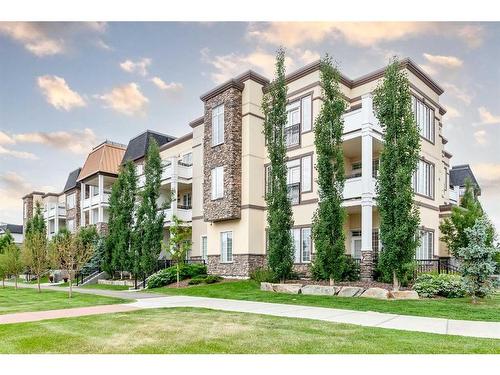 302-38 Quarry Gate Se, Calgary, AB - Outdoor With Balcony With Facade