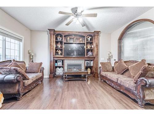 175 Taralake Way Ne, Calgary, AB - Indoor Photo Showing Living Room With Fireplace