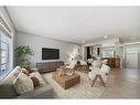 3074 New Brighton Gardens Se, Calgary, AB  - Indoor Photo Showing Living Room 