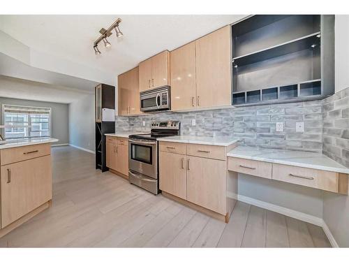 3074 New Brighton Gardens Se, Calgary, AB - Indoor Photo Showing Kitchen