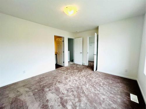 127 Carringford Road Nw, Calgary, AB - Indoor Photo Showing Other Room