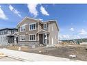 127 Carringford Road Nw, Calgary, AB  - Outdoor With Facade 