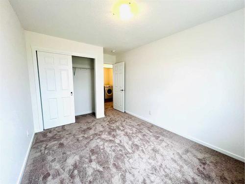 127 Carringford Road Nw, Calgary, AB - Indoor Photo Showing Laundry Room