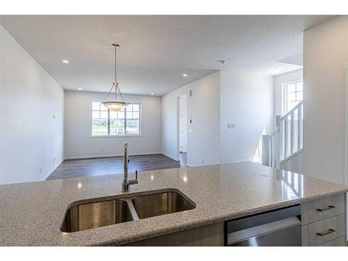 127 Carringford Road Nw, Calgary, AB - Indoor Photo Showing Kitchen With Double Sink