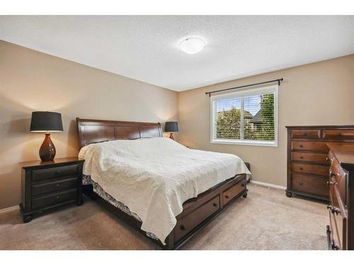 461 Cranford Drive Se, Calgary, AB - Indoor Photo Showing Living Room With Fireplace