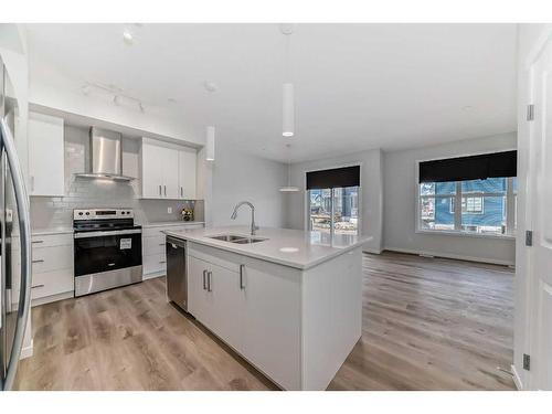 184 Hotchkiss Way Se, Calgary, AB - Indoor Photo Showing Kitchen With Double Sink With Upgraded Kitchen