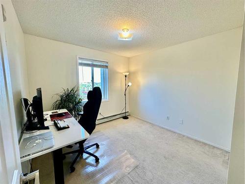 417-3000 Somervale Court Sw, Calgary, AB - Indoor Photo Showing Other Room