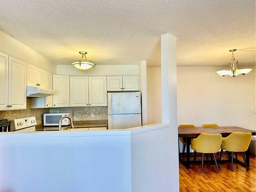 417-3000 Somervale Court Sw, Calgary, AB - Indoor Photo Showing Kitchen