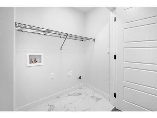 21 Amblefield Passage Nw, Calgary, AB - Indoor Photo Showing Other Room