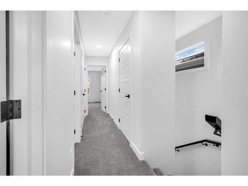 21 Amblefield Passage Nw, Calgary, AB - Indoor Photo Showing Other Room