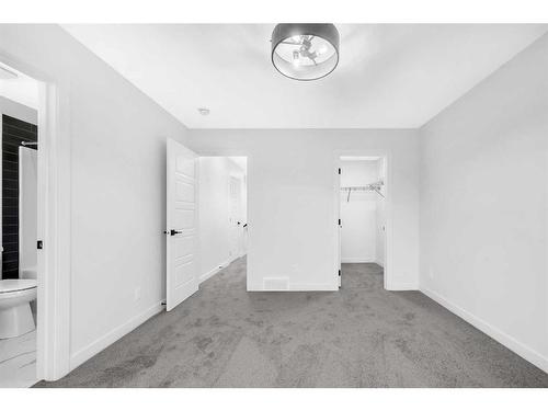 21 Amblefield Passage Nw, Calgary, AB - Indoor Photo Showing Other Room