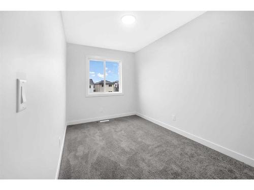 21 Amblefield Passage Nw, Calgary, AB - Indoor Photo Showing Other Room