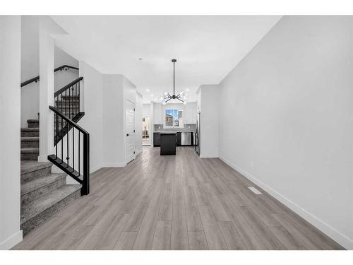 21 Amblefield Passage Nw, Calgary, AB - Indoor Photo Showing Other Room