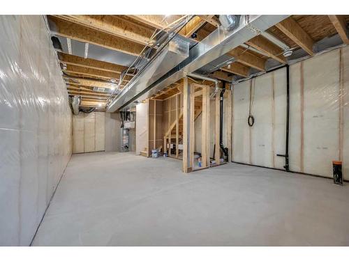 21 Amblefield Passage Nw, Calgary, AB - Indoor Photo Showing Basement