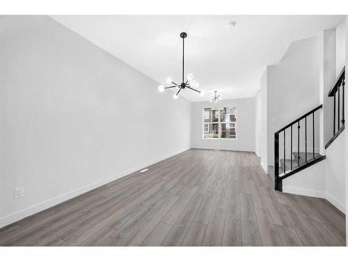 21 Amblefield Passage Nw, Calgary, AB - Indoor Photo Showing Other Room