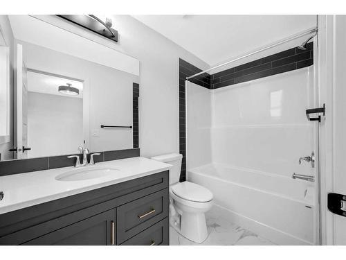 21 Amblefield Passage Nw, Calgary, AB - Indoor Photo Showing Kitchen With Upgraded Kitchen