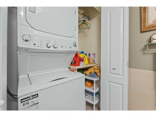 49 Richelieu Court Sw, Calgary, AB - Indoor Photo Showing Laundry Room