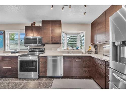 48 Armstrong Crescent Se, Calgary, AB - Indoor Photo Showing Kitchen With Stainless Steel Kitchen