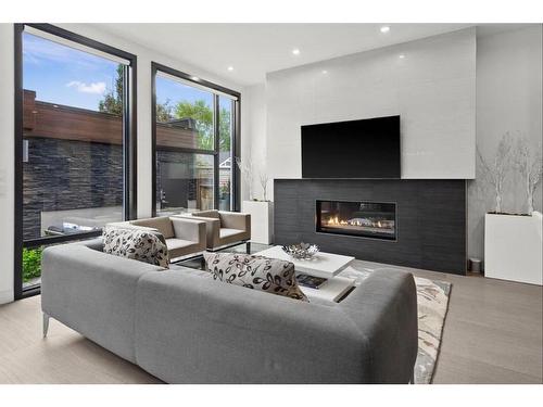 3-408 13 Street Nw, Calgary, AB - Indoor Photo Showing Living Room With Fireplace